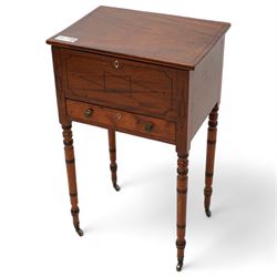 George III mahogany work table, rectangular hinged top enclosing upholstered interior, fitted with single drawer, the front inlaid with geometric stringing, on ring turned supports with brass cups and castors  