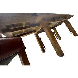 Oak dining table, rectangular plank with two extension leaves at each end, central drawer with brass handle, supported by square legs (L131cm - 233cm, D80cm, H76cm); four high-back dining chairs, the chairs upholstered in dark brown leatherette with stitched detailing, on square tapering legs (H108cm)