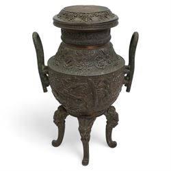 Large 19th century Japanese bronze koro, the ovoid body decorated in relief with phoenix a...