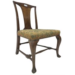 Mid-18th century mahogany side chair, shaped cresting rail over tapered back splat, seat upholstered in green and camel foliate patterned fabric with stud work border, raised on cabriole supports united by swell-turned stretchers