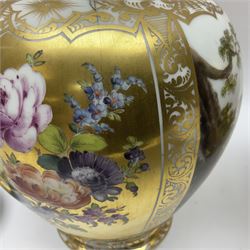 Pair of late 19th century Helena Wolfsohn vases and covers, each of baluster form with domed cover, painted with alternating panels of romantic scenes and floral sprays upon gilt ground, with Augustus Rex mark to base, H27cm