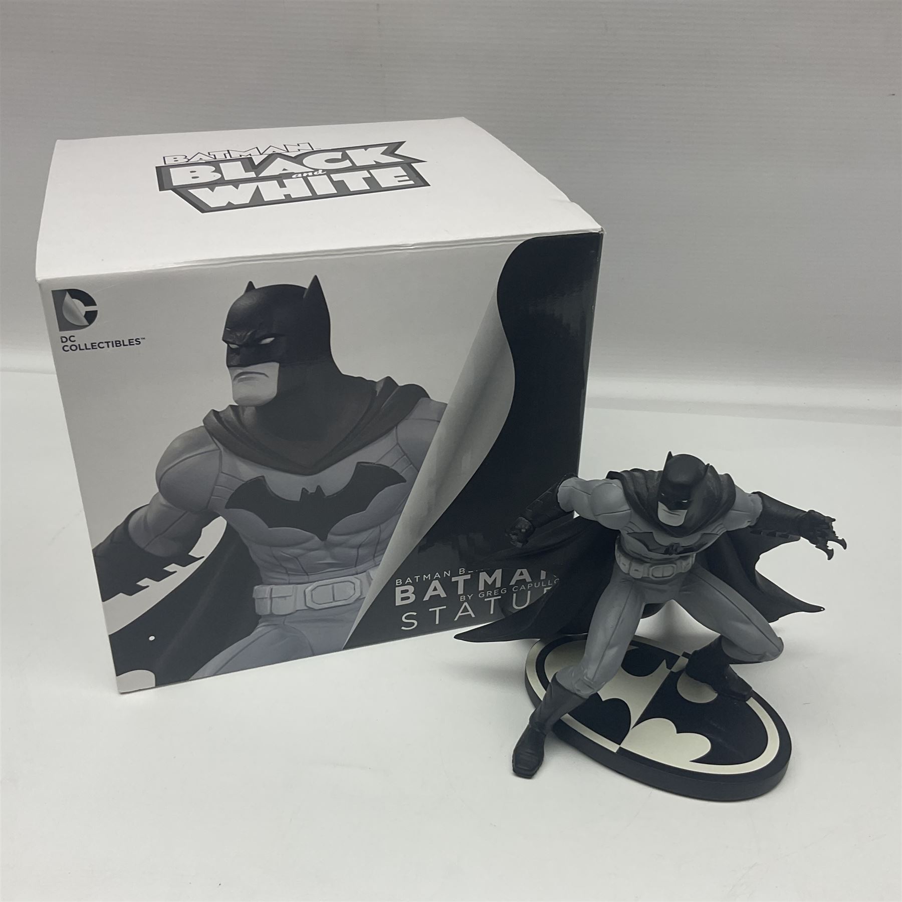 Group of five limited edition DC Direct Black and White Batman hand-painted cold-cast porcelain statues in original boxes, with two similar examples from DC Collectibles 