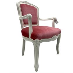 20th century French style armchair, painted white wood frame with carved floral decoration, pink upholstered back and seat, on cabriole supports