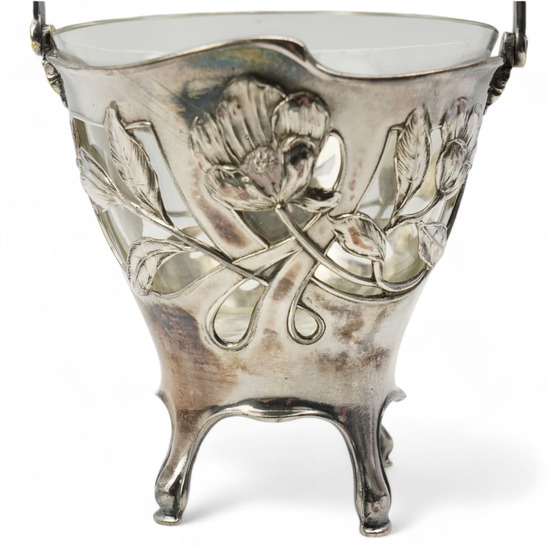 Early 20th century German Art Nouveau silver-plated bonbon basket by Dupper & Bernhold - Esslingen, with pierced and moulded floral body, stylised swing handle and glass liner, stamped DBE, H18cm 