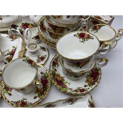 Royal Albert Old Country Roses pattern coffee service for six, comprising coffee pot, milk jug, cups and saucers, cake plate, together with miniature teapot, six teacups and saucers, six dinner plates, six side plates etc 