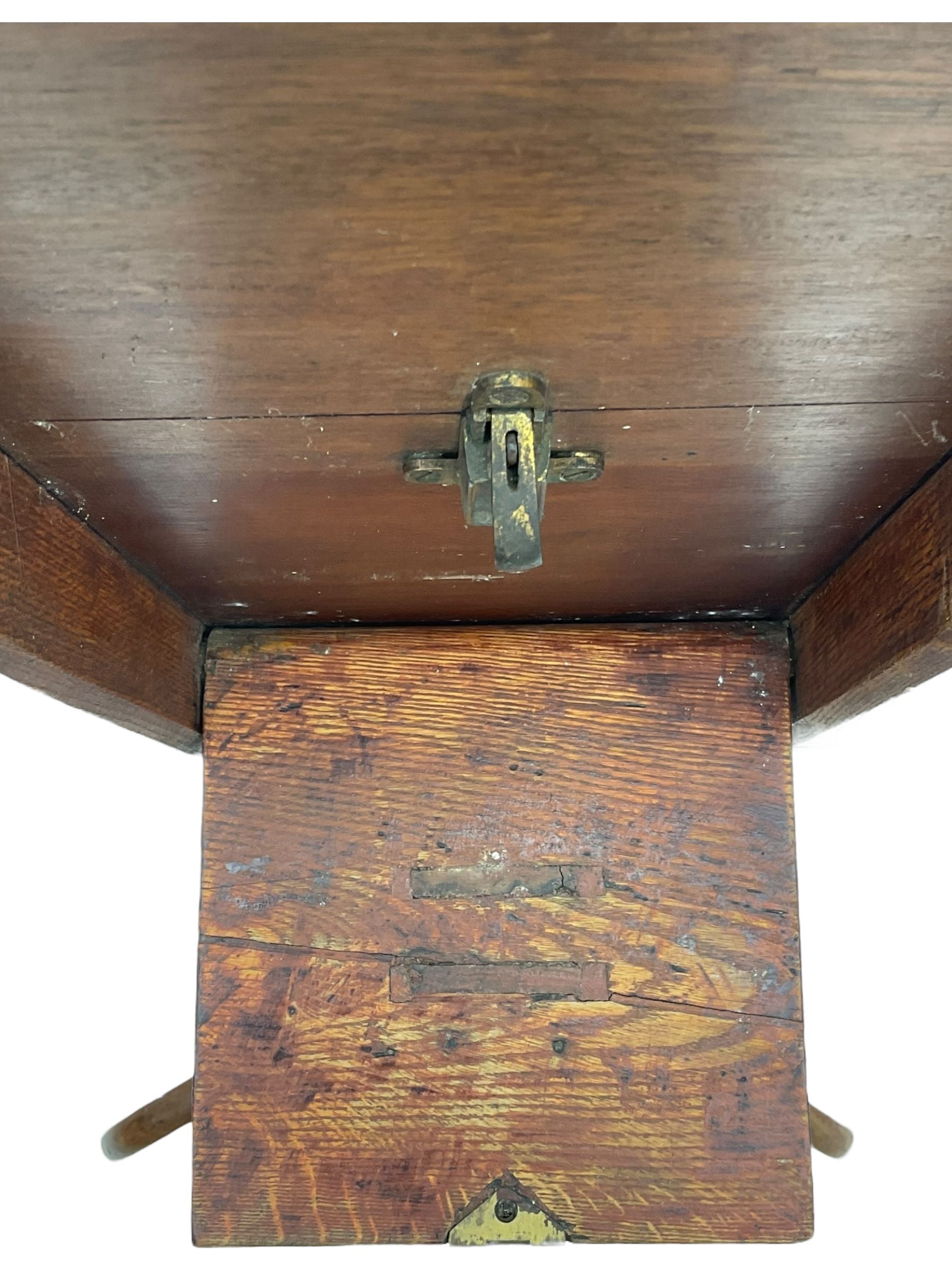 19th century walnut tripod table, square canted tilt-top with chamfered edge, turned pedestal with three splayed supports