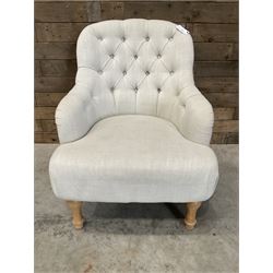 Armchair upholstered in button back linen fabric