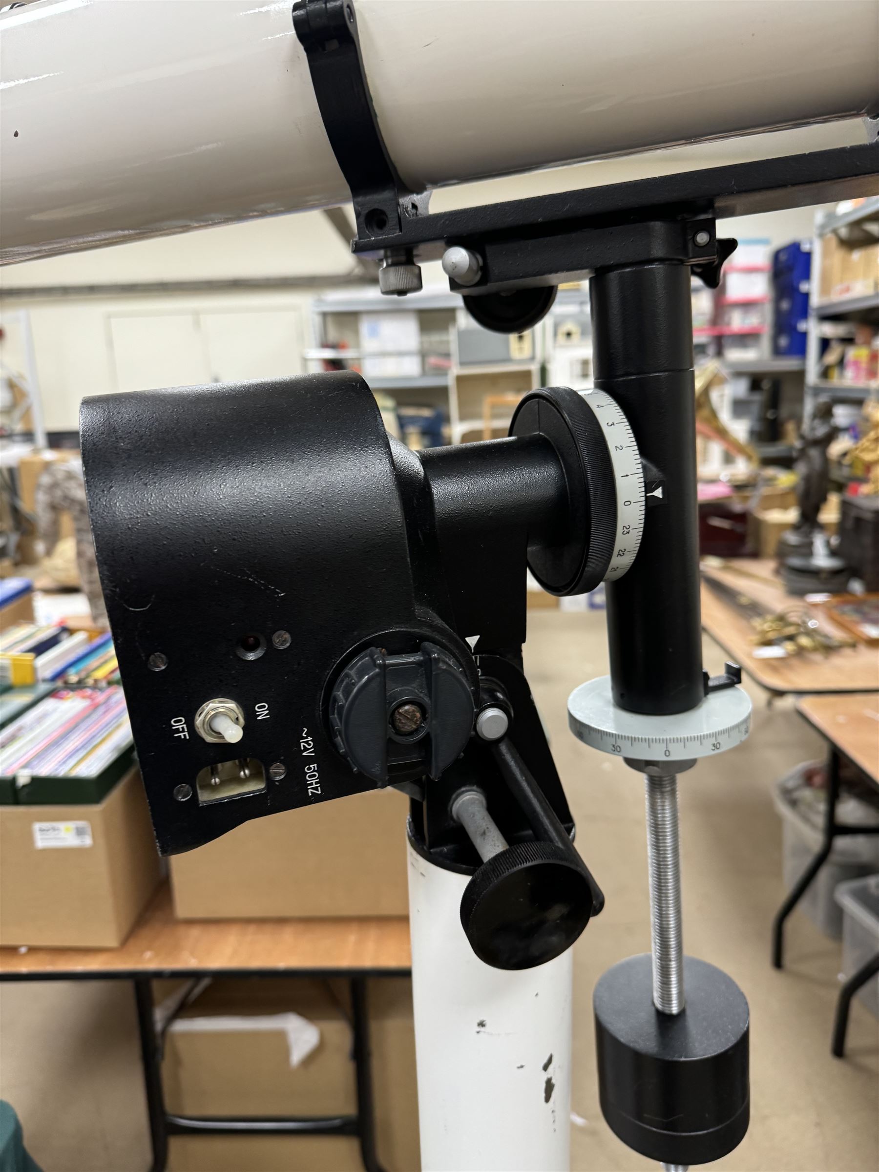 Tal-100R refractor telescope, the objective lens with dark purple coating and cylinder mounted with 6mm x 30mm finder scope, upon a pillar mount with right ascension clock drive, height when mounted H168cm, aperture 10cm, focal length 100cm 