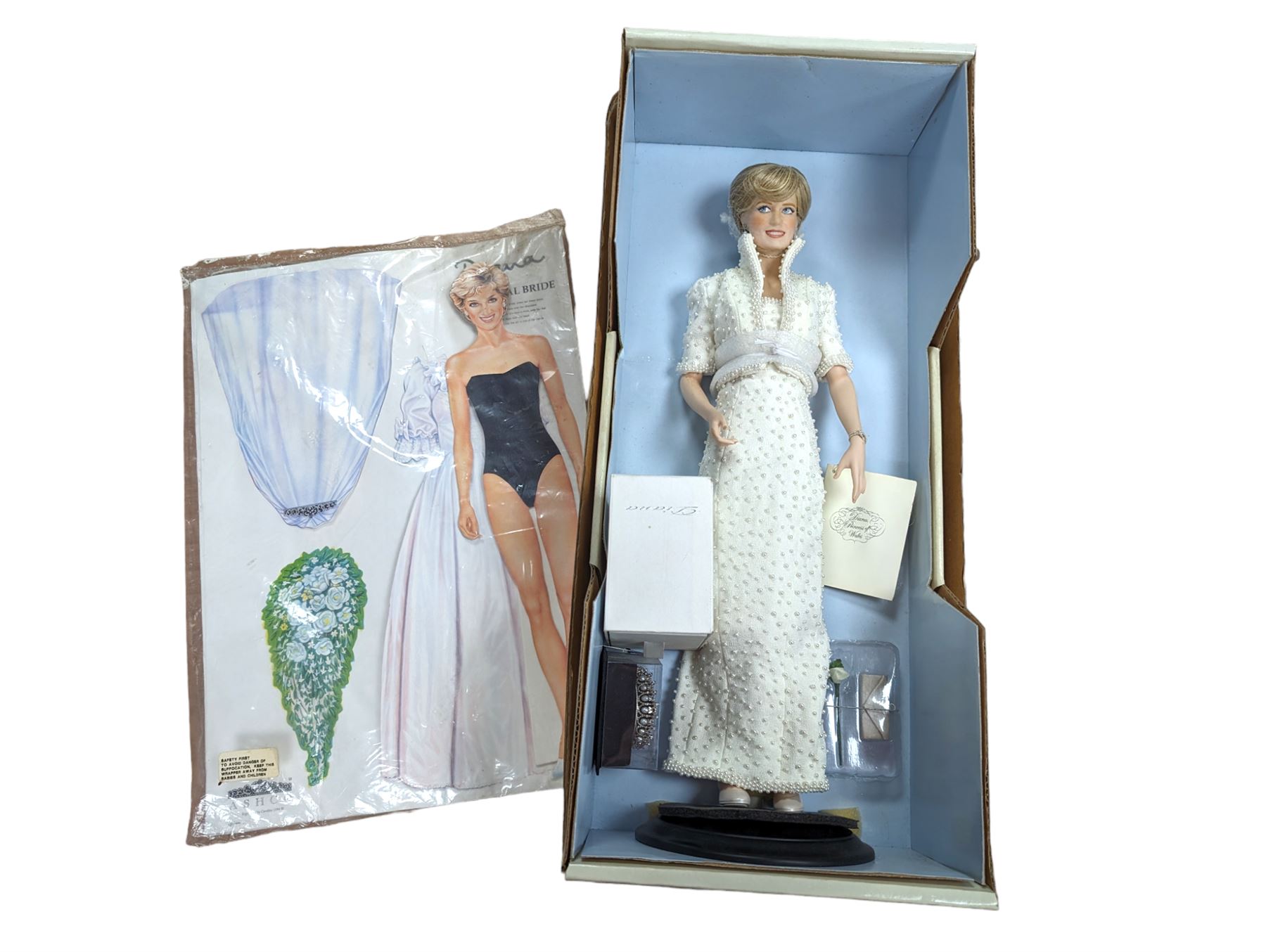 The Franklin Mint Diana Princess of Wales Doll, boxed together with an Ascho The Royal Bride paper Diana doll 