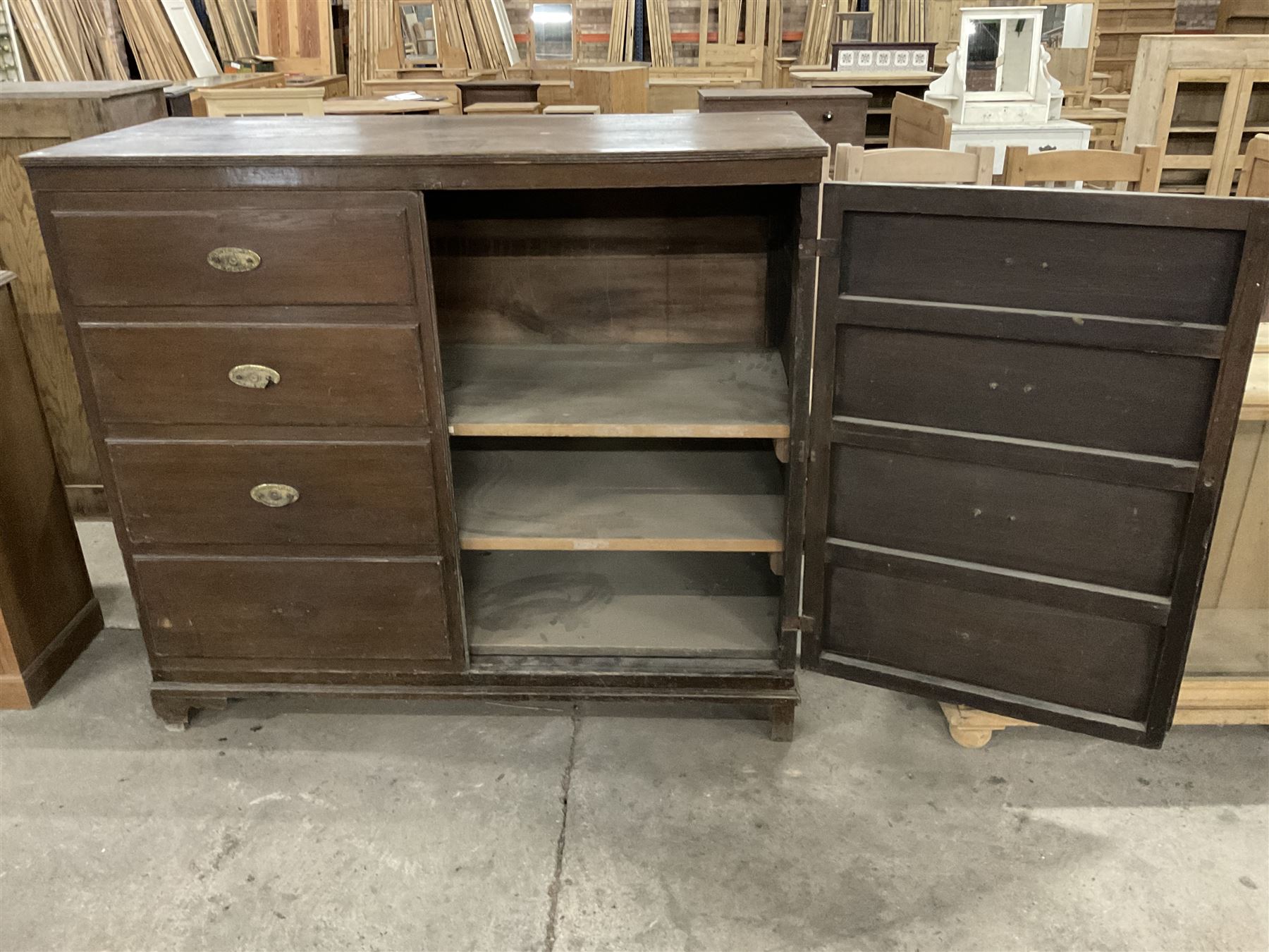 Early 20th century oak cupboard disguised as a chest of eight drawers, reeded edge over two doors with panelled facias - THIS LOT IS TO BE COLLECTED BY APPOINTMENT FROM THE OLD BUFFER DEPOT, MELBOURNE PLACE, SOWERBY, THIRSK, YO7 1QY