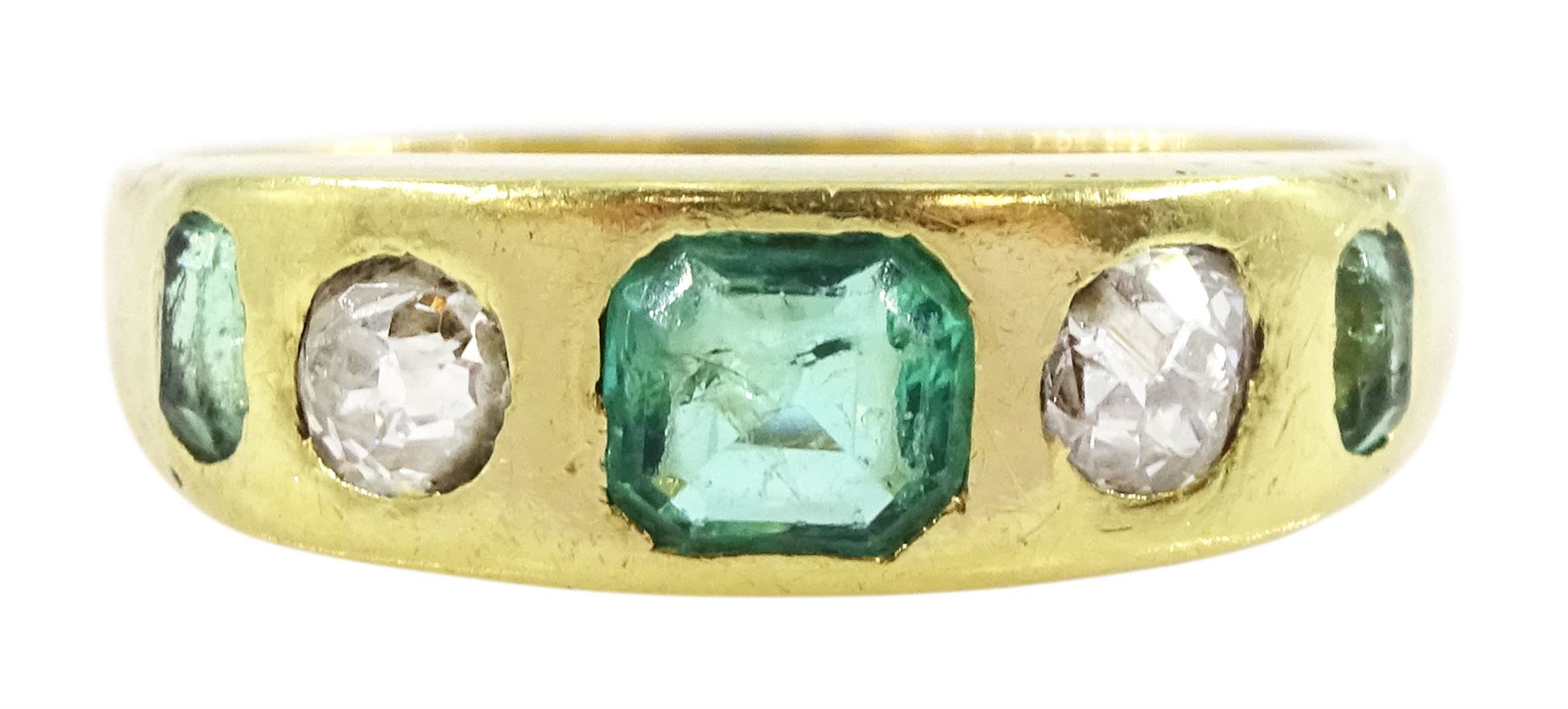 Victorian five stone gypsy set octagonal cut emerald and old cut diamond ring, possibly 1876, total diamond weight approx 0.33 carat