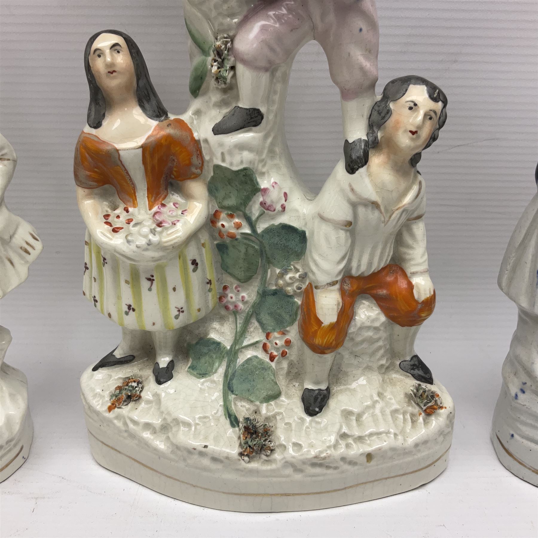 Collection of 19th century and later Staffordshire figures, including figure of a spill vases, figure groups and houses, tallest H28cm (11)