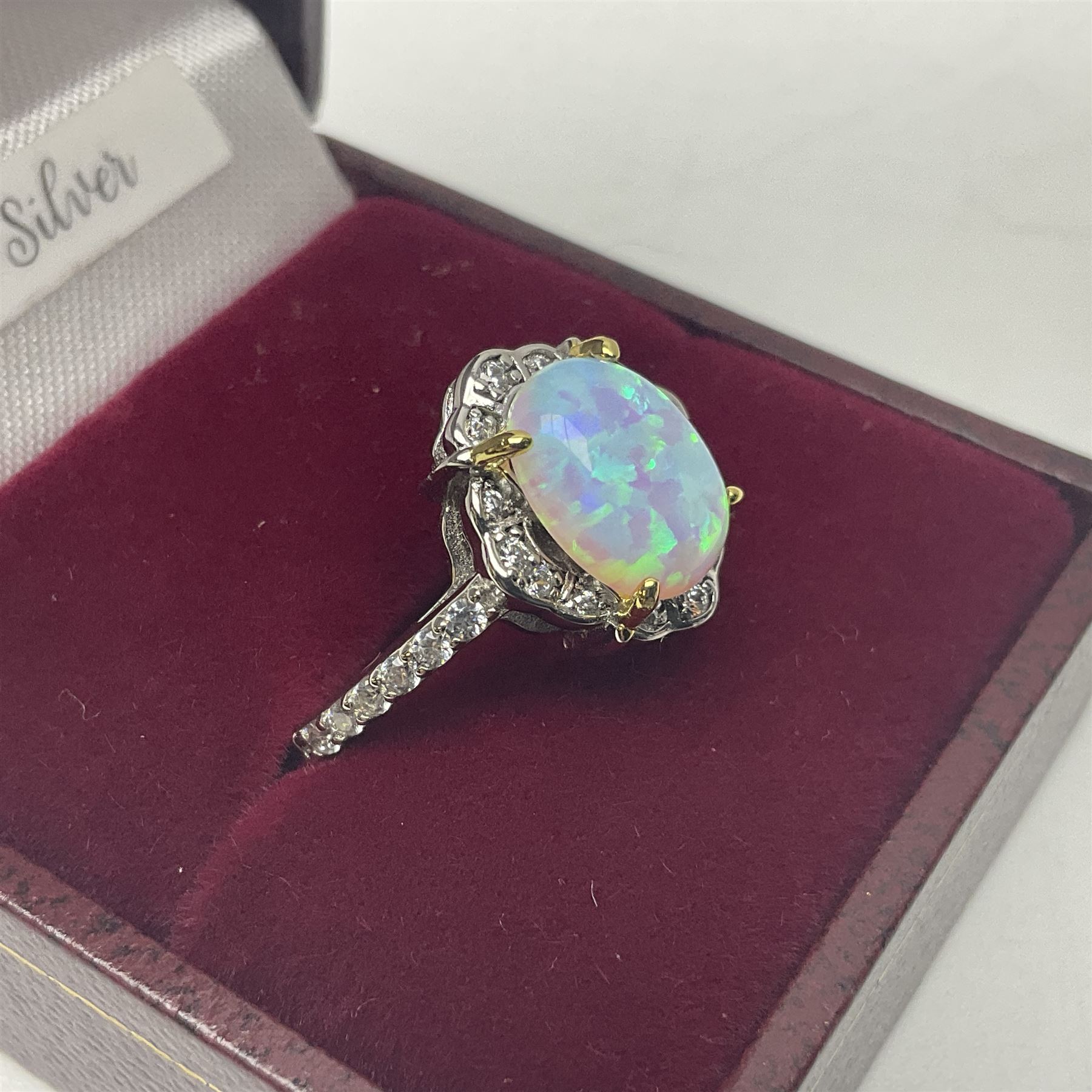 Silver opal and cubic zirconia cluster ring, stamped 925, boxed 