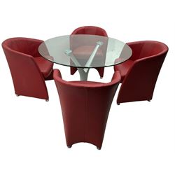 Rolf Benz glass dining table, circular bevelled glass top supported by central Y-shaped brushed metal column, terminating in circular glass base; four red leather tub chairs with curved backrests and vertical stitching, on round chrome feet (5)