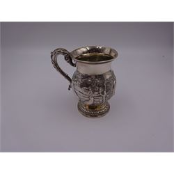 William IV silver christening mug, of waisted form, the body embossed with game birds in a countryside setting and a blank circular cartouche, with acanthus leaf capped scroll handle, upon a circular stepped foot, hallmarked Edward, Edward junior, John & William Barnard, London 1831, H10.2cm