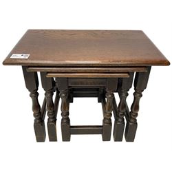 Mid-to-late 20th century medium oak nest of three occasional tables