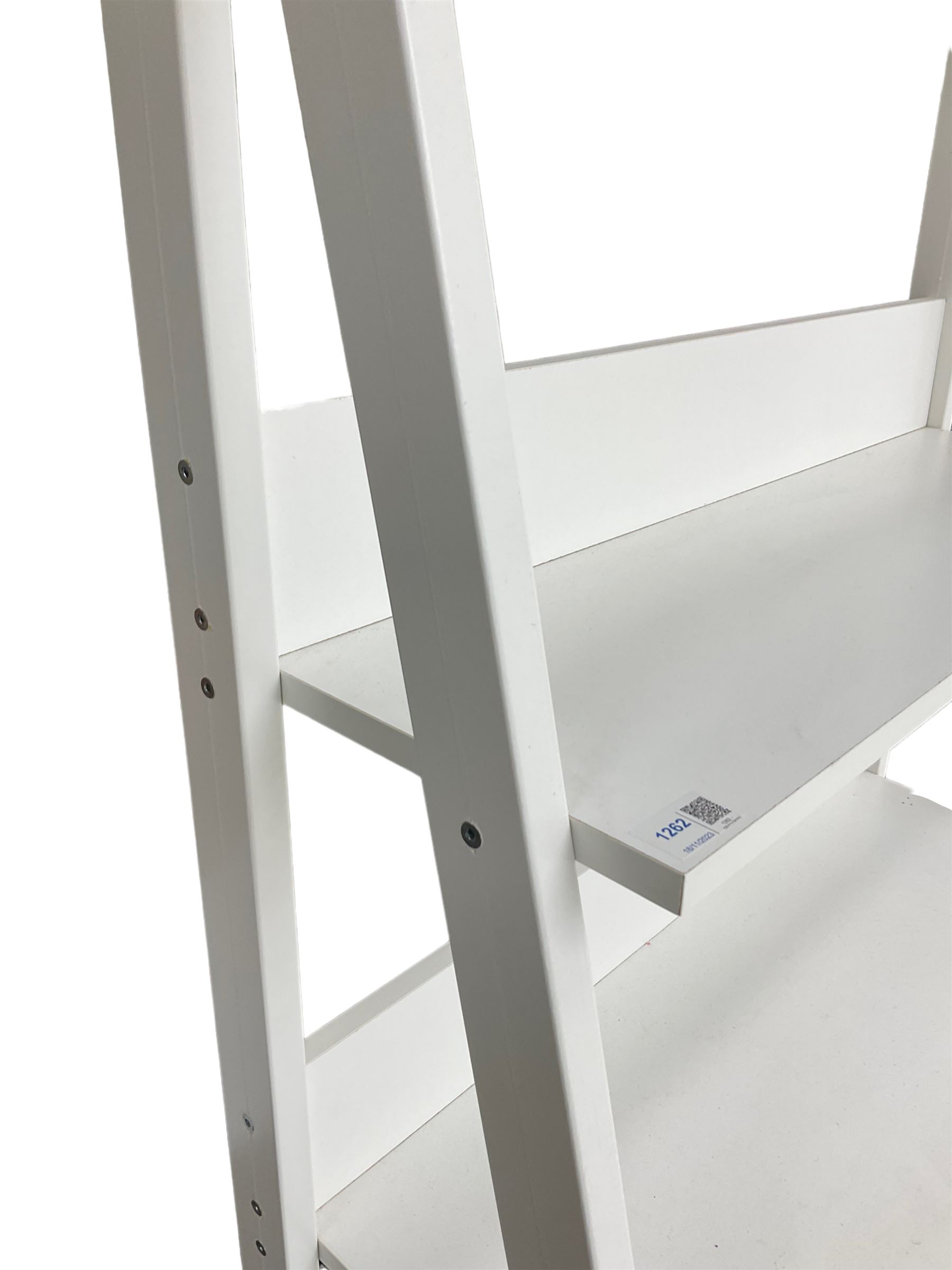 Contemporary white finish shelving unit, five graduating sloped shelves