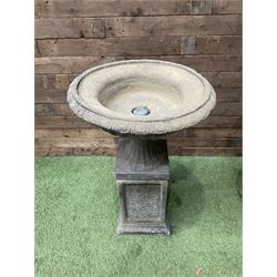 Pair of Victorian design cast stone squat garden urns, egg and dart border, raised on pedestal base and square fielded plinth - THIS LOT IS TO BE COLLECTED BY APPOINTMENT FROM DUGGLEBY STORAGE, GREAT HILL, EASTFIELD, SCARBOROUGH, YO11 3TX