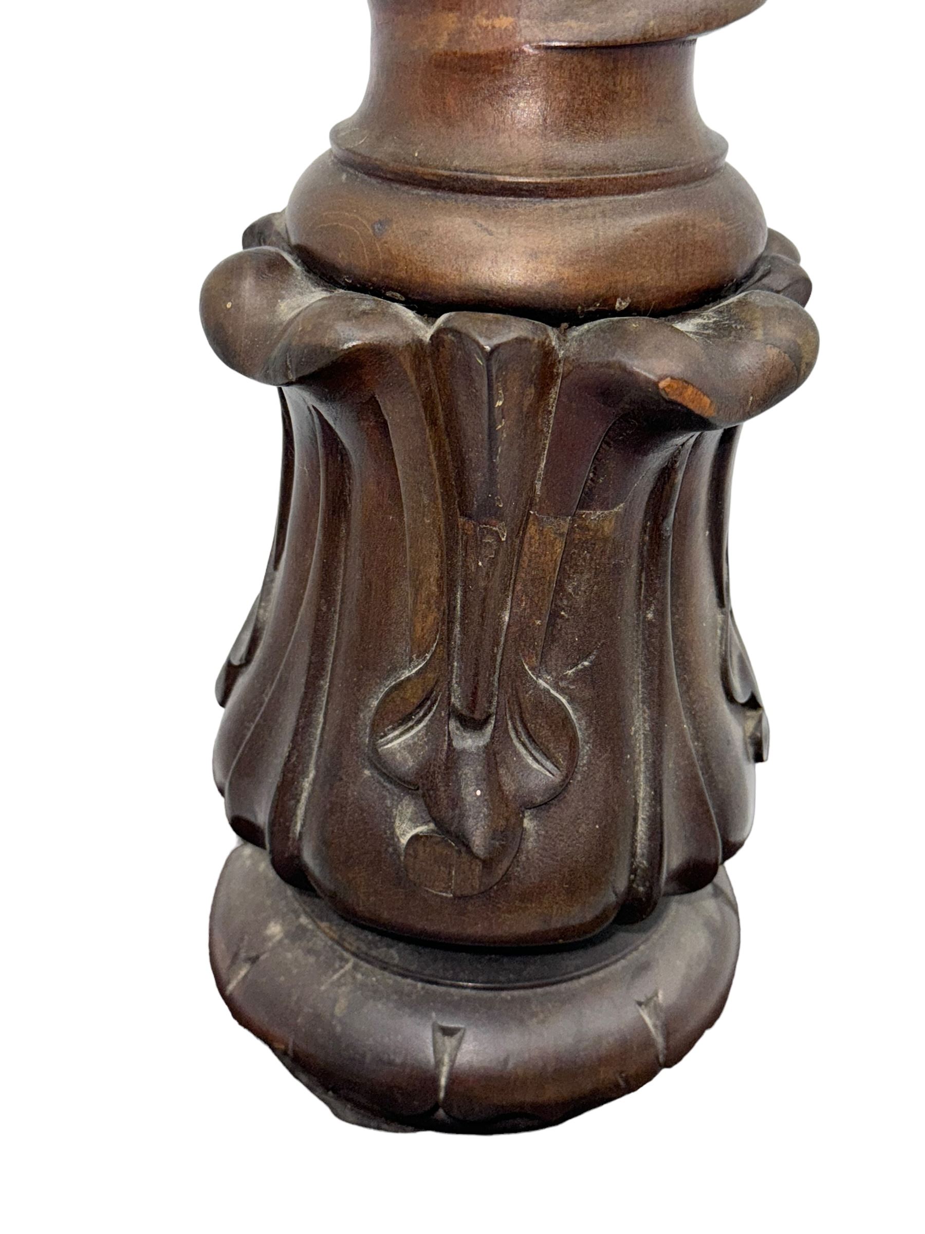 Late 19th century mahogany plant stand or torchère, circular top over barley twist column and carved acanthus base, on square plinth with bracket supports