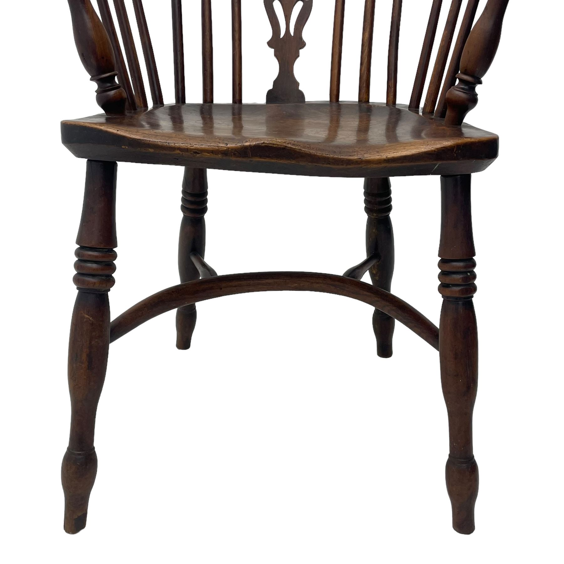 19th century yew wood and elm Windsor armchair, low double hoop stick and pierced splat back, dished seat on turned supports united by crinoline stretchers