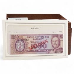 The Franklin Mint 'Specimen Banknotes From Around The World' comprising Gibraltar, Chana, Ireland, Jersey, Tonga, Swaziland,  Mauritius, Bahrain, Dominican Republic, Malta, Philippines, Sierra Leone, Paraguay, Botswana and Solomon Islands, each with certificate of authenticity