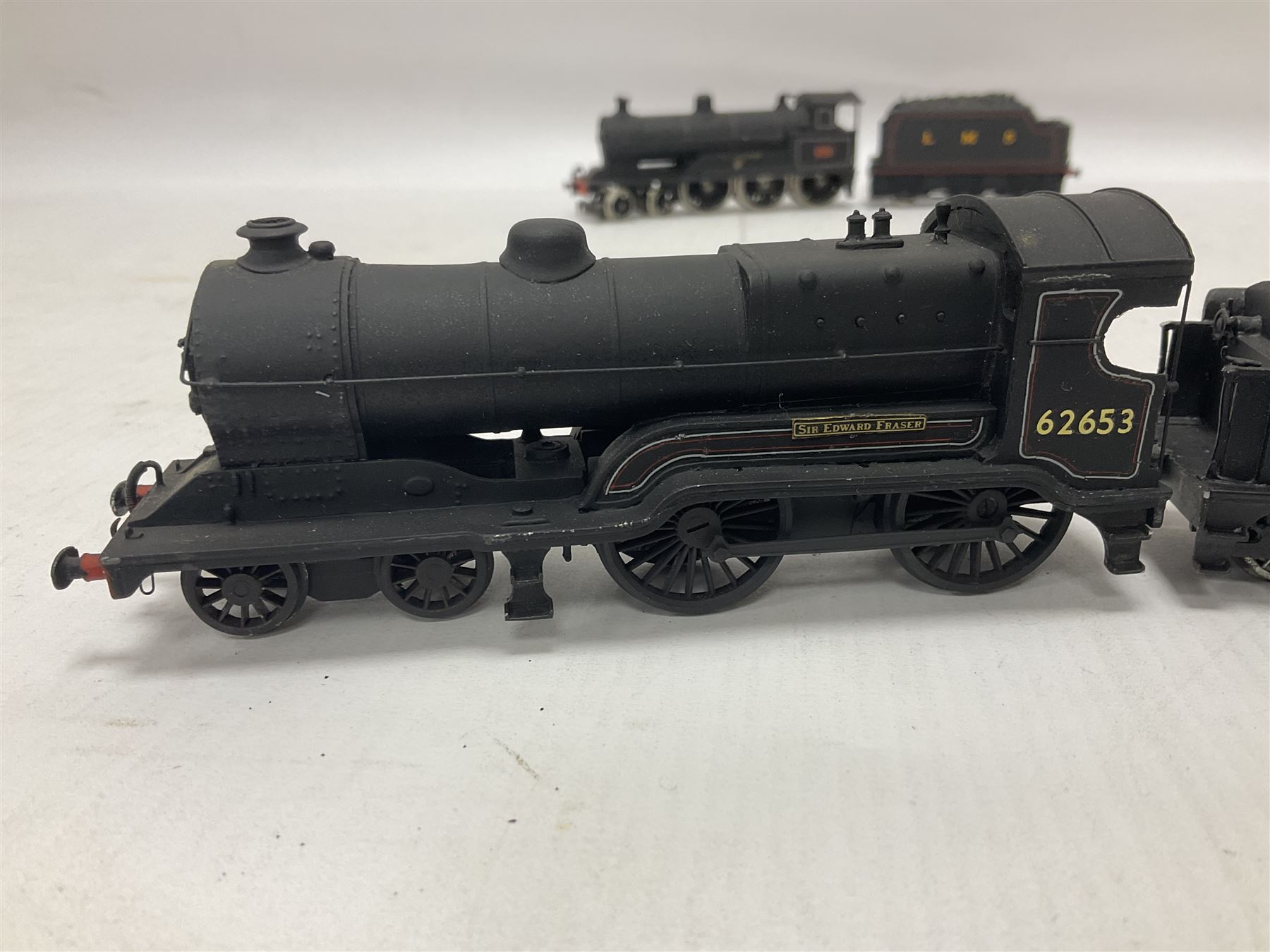 ‘00’ gauge - four kit built steam locomotives and tenders comprising LNWR Experiment Class ‘Stephenson’ 4-6-0 no.2052 finished in LMS black; Class D10 ‘Sir Edward Fraser’ 4-4-0 no.62653 finished in BR black; Class D14 4-4-0 no.62501 finished in BR black with LNER tender; Class E4 2-4-0 no.62786 finished in BR black (4) 