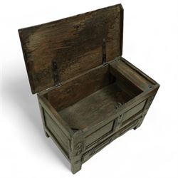 Small 18th century oak mule chest, rectangular hinged top top with moulded edge, enclosing candle box, over a double panelled front flanked by foliate carvings, single drawer fitted to base, on stile supports