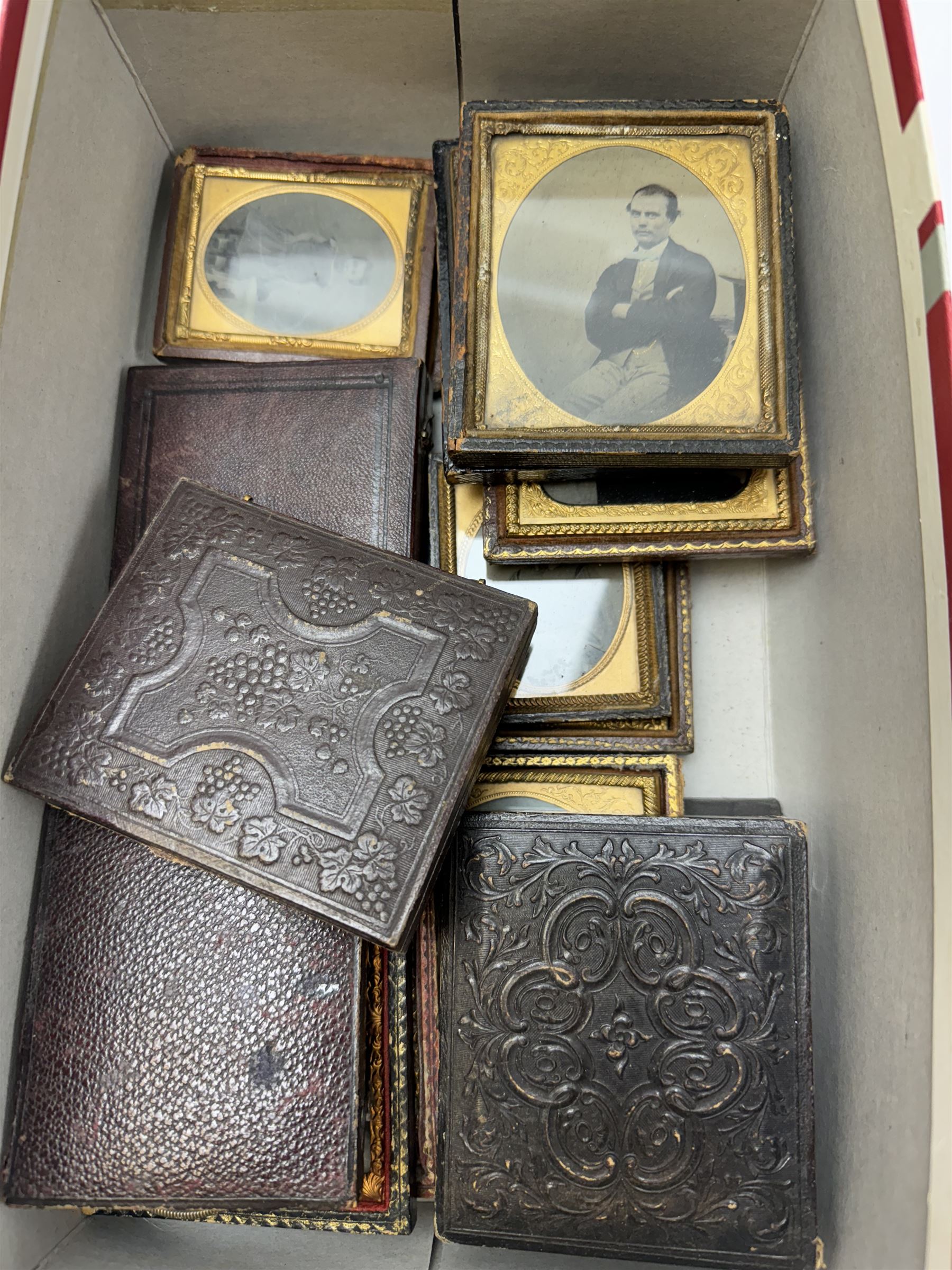 Collection of Victorian daguerreotypes, together with other photographs