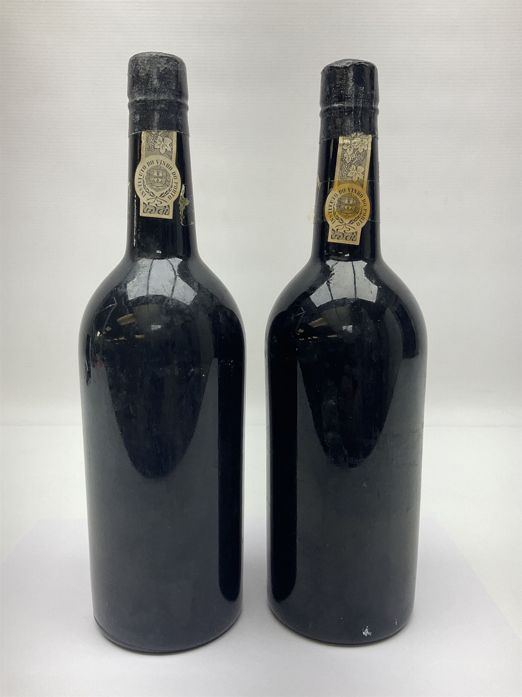 Dow's 1966 vintage port, two bottles, unknown contents and proof 