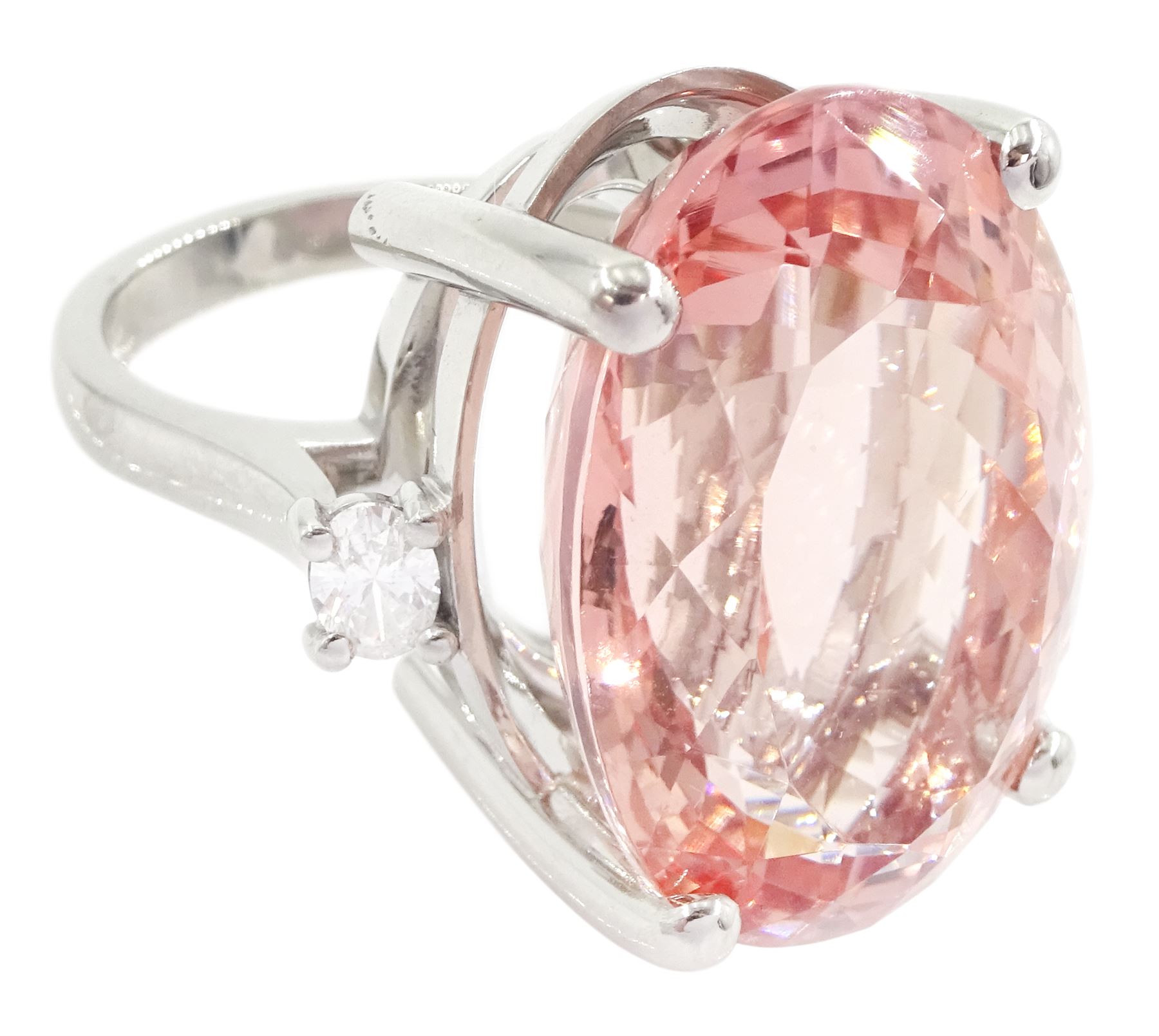 Platinum three stone large oval cut morganite and oval cut diamond ring, hallmarked, morganite 33.80 carat, total diamond weight 0.60 carat, with World Gemological Institute report