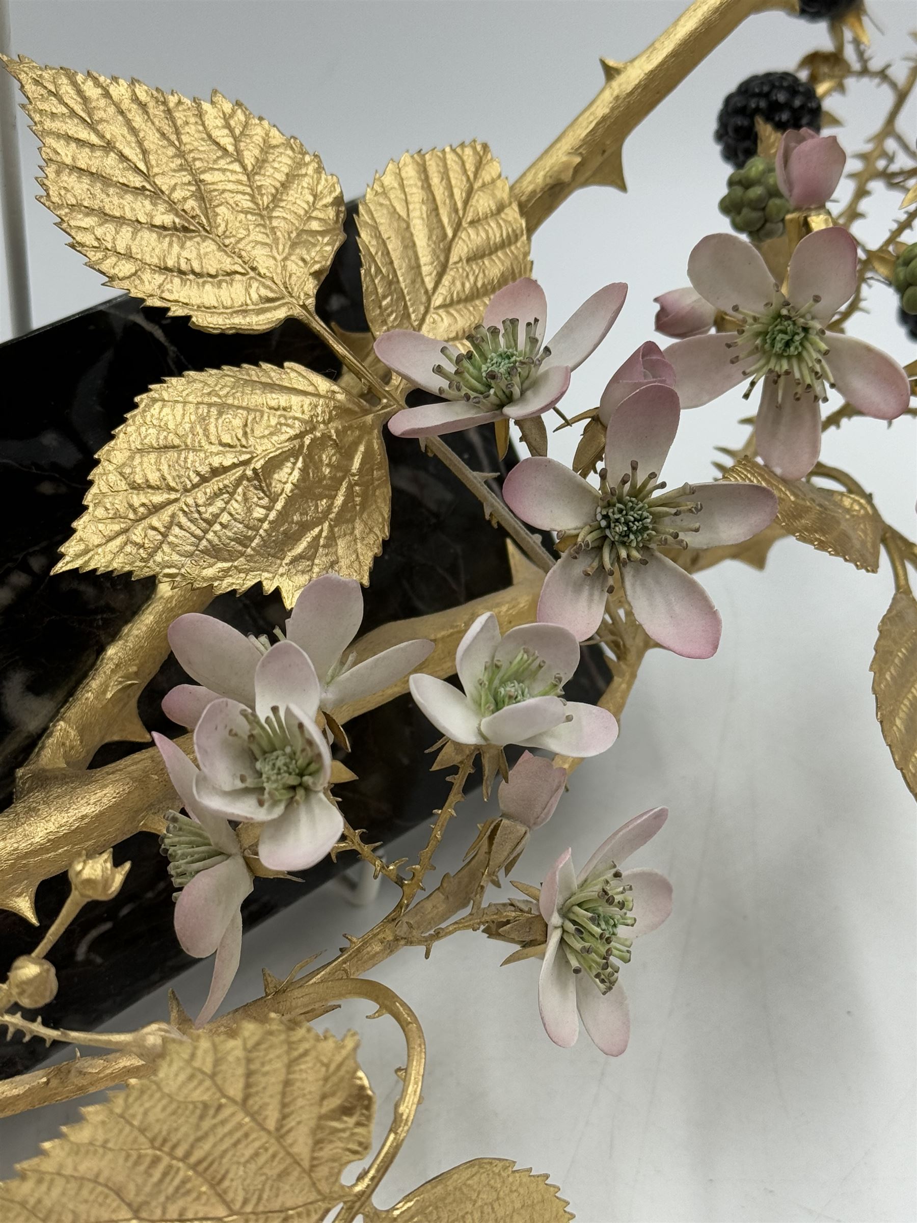 Ruth van Ruyckevelt for St Denis (ex-Royal Worcester) bone china and gilt bronze sculpture of blackberries, upon marble plinth with inset porcelain plaque beneth, code No.A109, overall L39cm