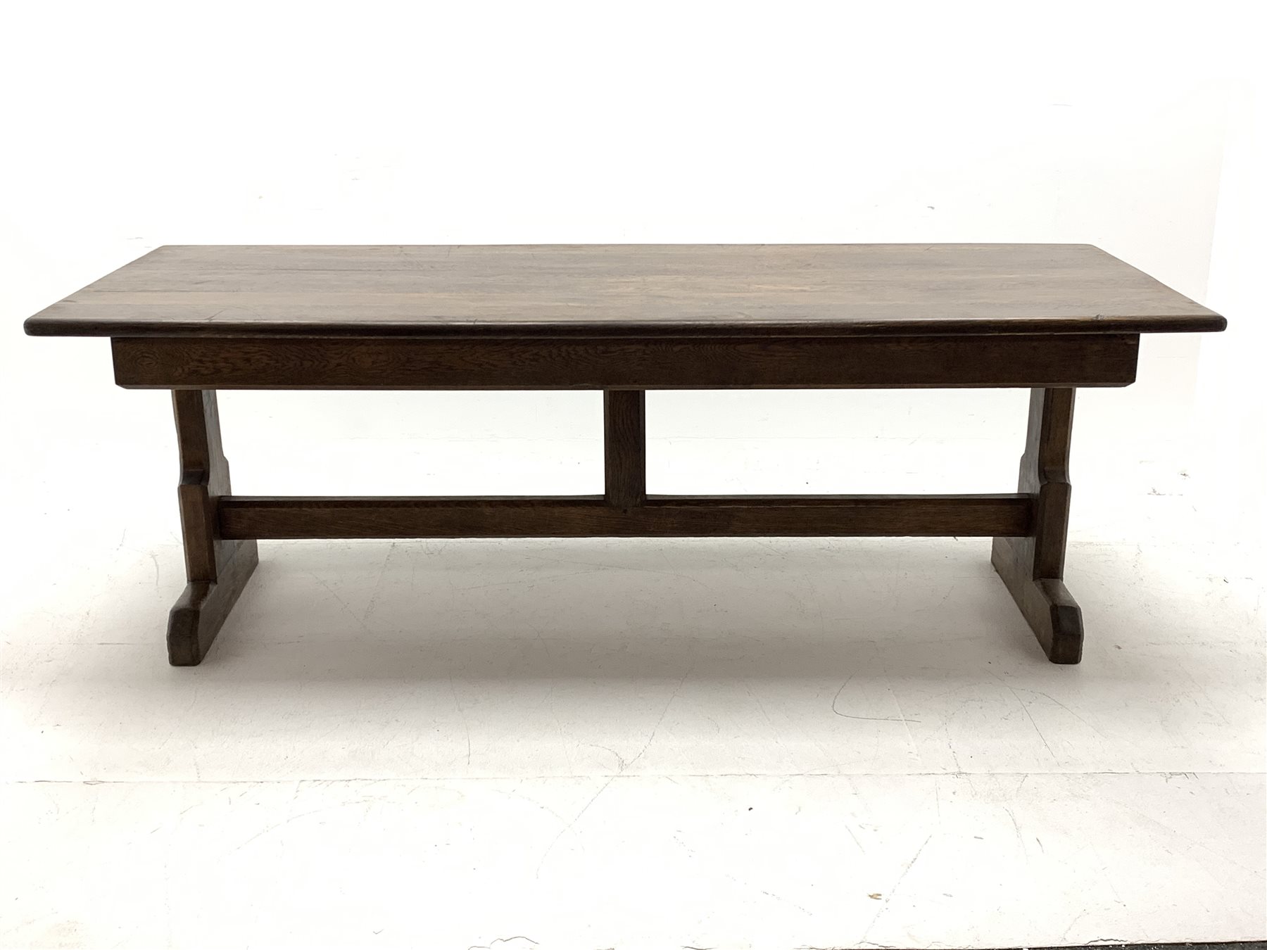 Large oak refectory dining table, rectangular moulded plank top, shaped end supports connected by stretcher, sledge feet, 229cm x 90cm, H79cm