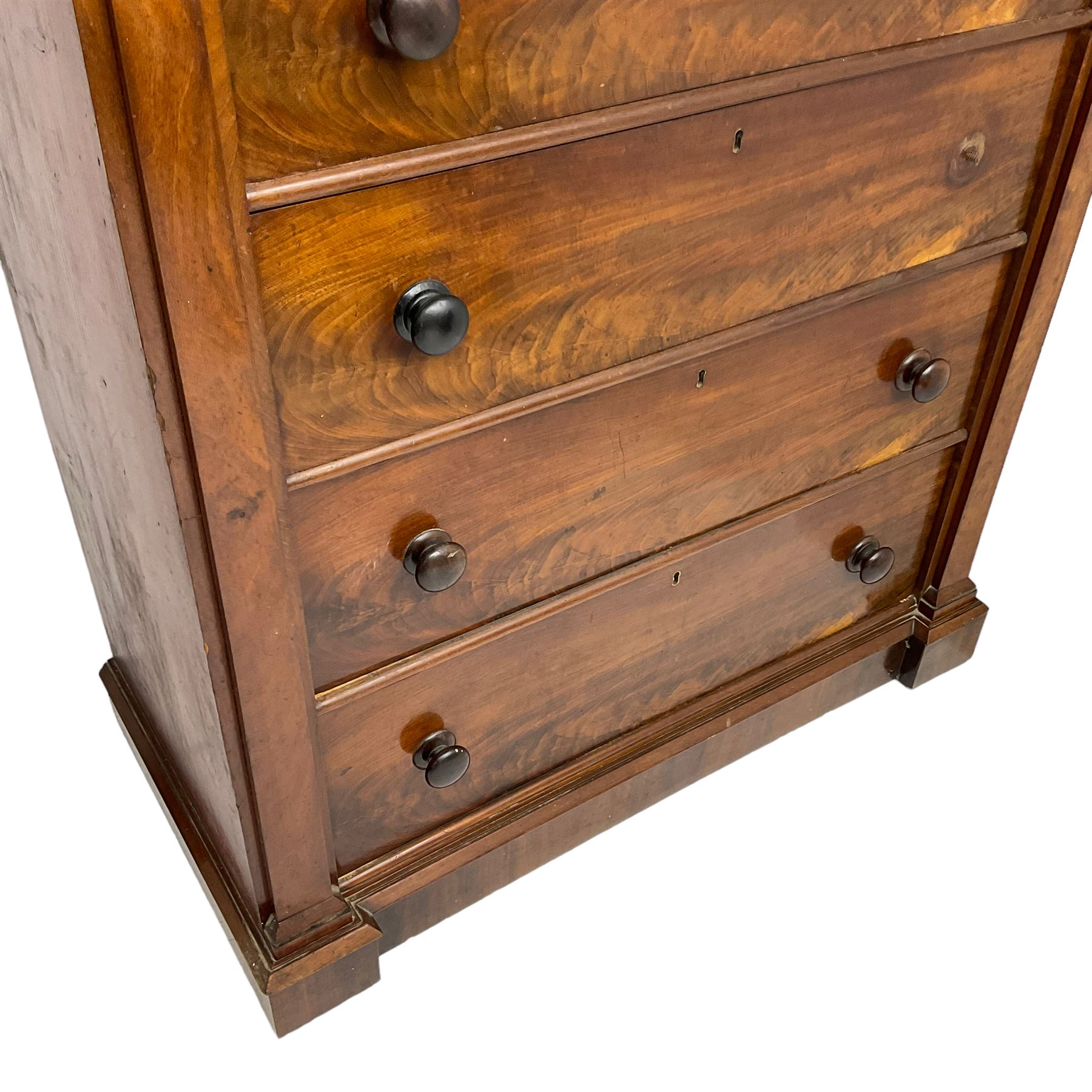 Victorian mahogany straight fronted chest, fitted with four drawers enclosing by square upright pilasters, on stepped chamfered plinth base