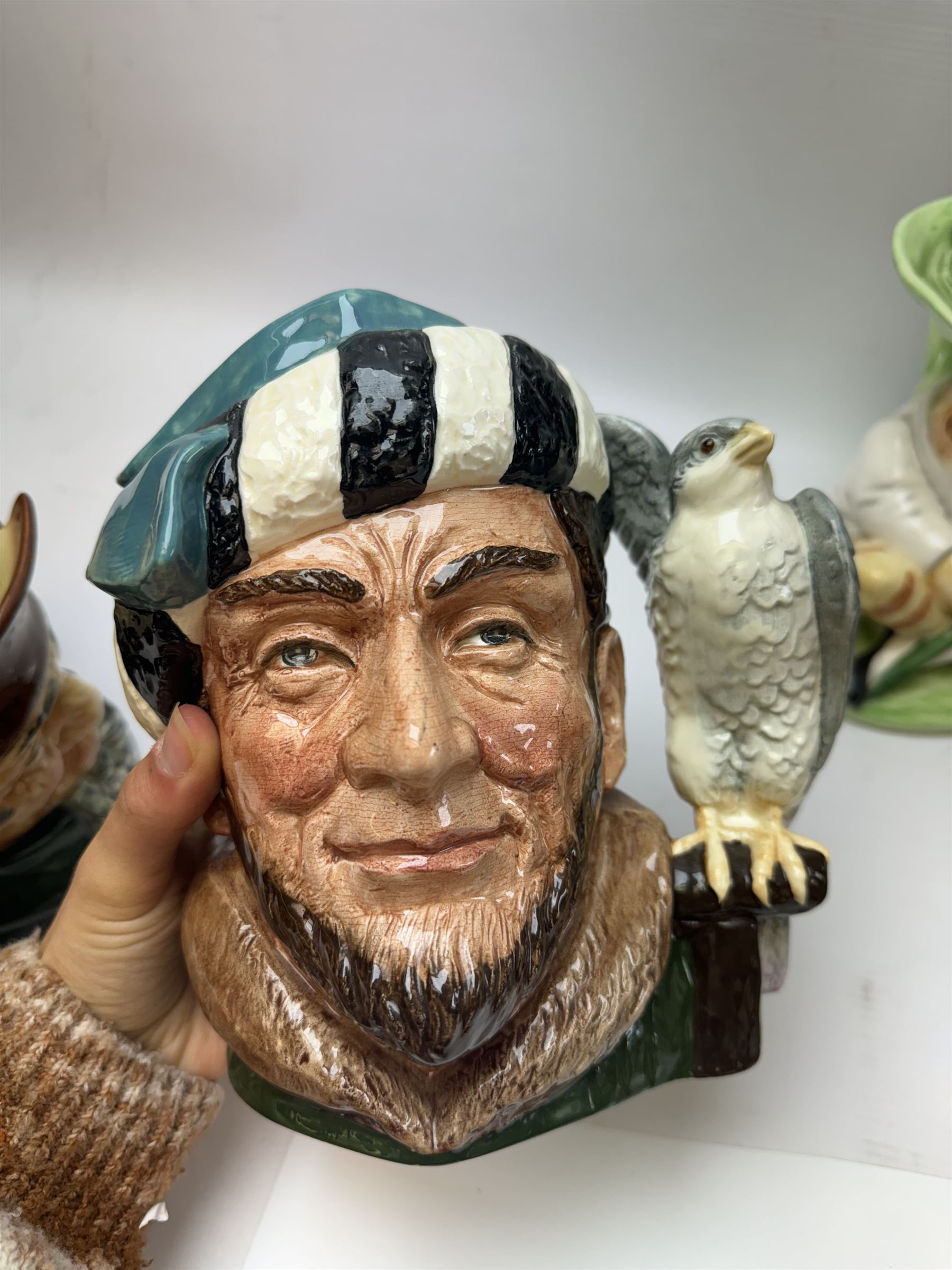 Collection of character jugs, including Royal Doulton Long John Silver, The Falconer, Granny etc