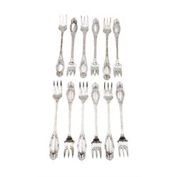 Set of twelve American silver oyster/pickle forks, three pronged forks, the stem decorated with ribbon banding and foliate border surrounding an engraved initial, stamped Sterling 