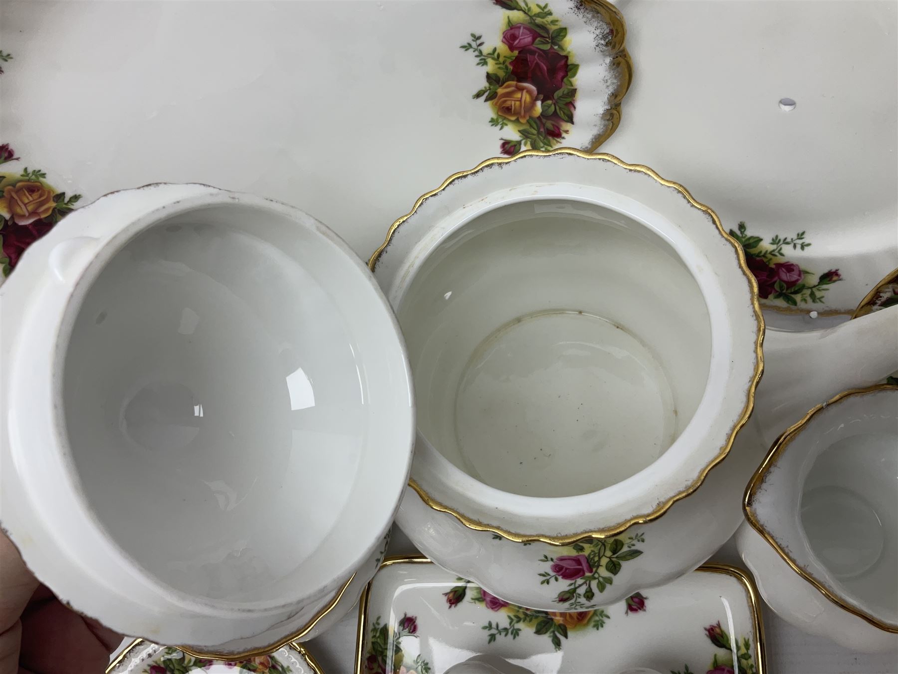 Royal Albert Old Country Roses, tea service for six, comprising teapot, milk jug, open sucrier, teacups and saucers, cake plate, together with other items 