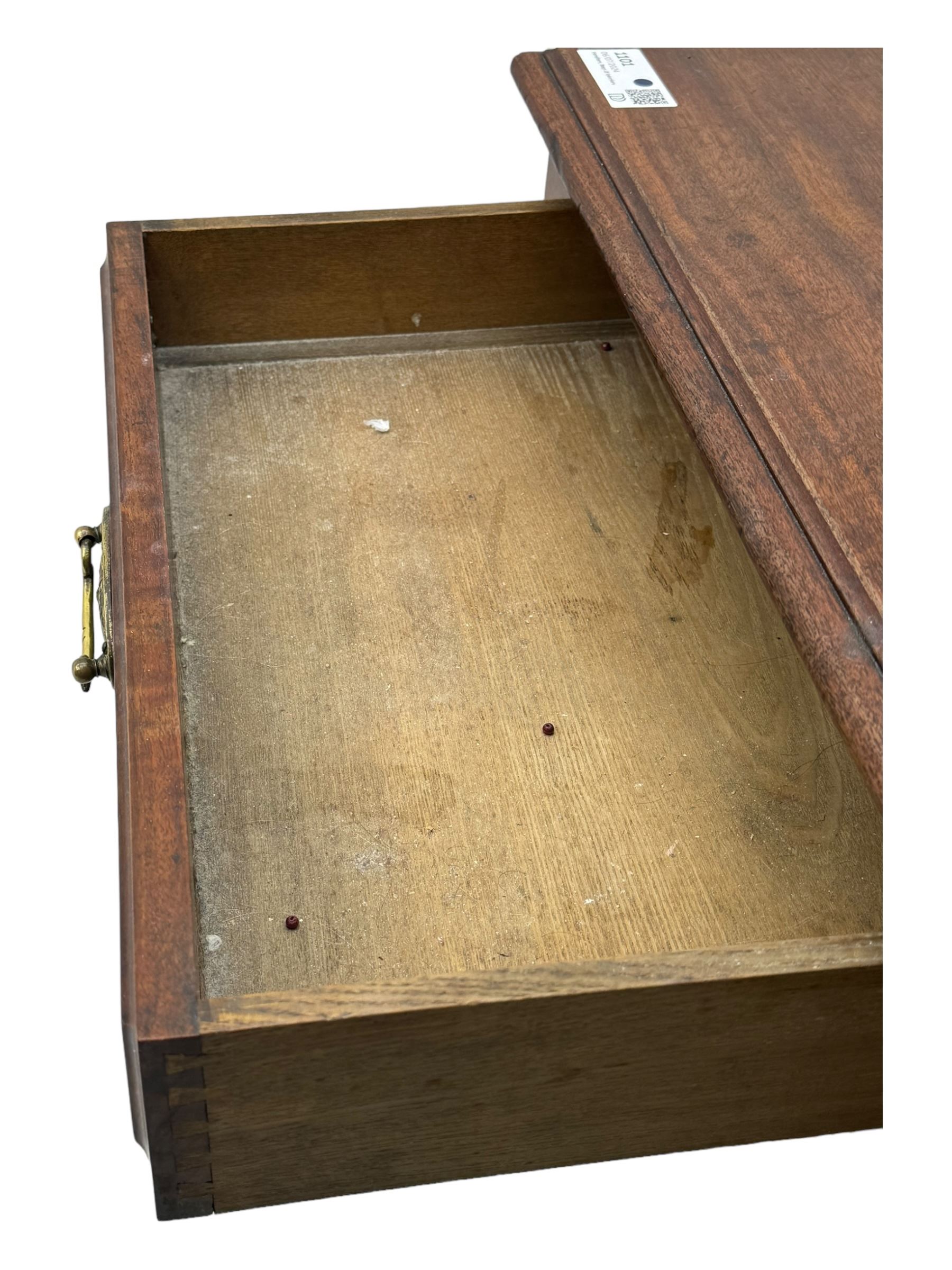 Late Victorian walnut dressing table, raised bevelled swing mirror over small trinket drawers, rectangular moulded top, fitted with two drawers, on turned supports united by undertier 