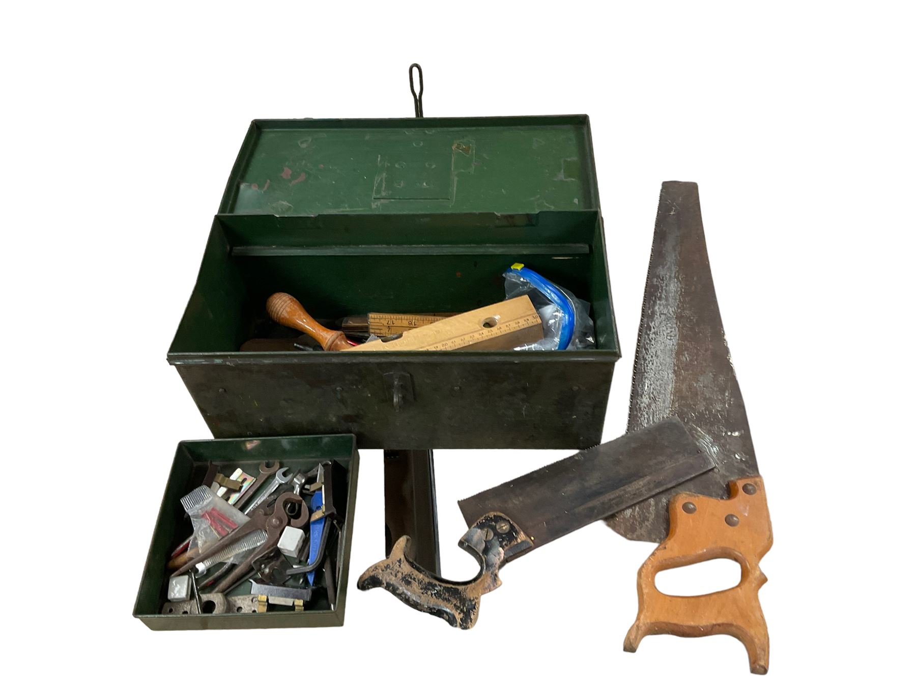 Green tin box of tools, including saws, spanners etc