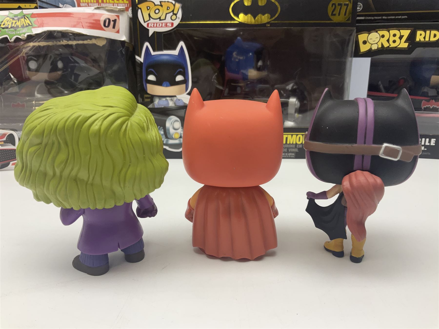 Thirteen Funko! Pop figurines of predominately Batman interest, to include 2016 ‘Batman Classic TV Series Batmobile’ and 2019 teal coloured ‘Batman’ Summer Convention exclusives, most in original boxes, with three similar boxed figures (16)