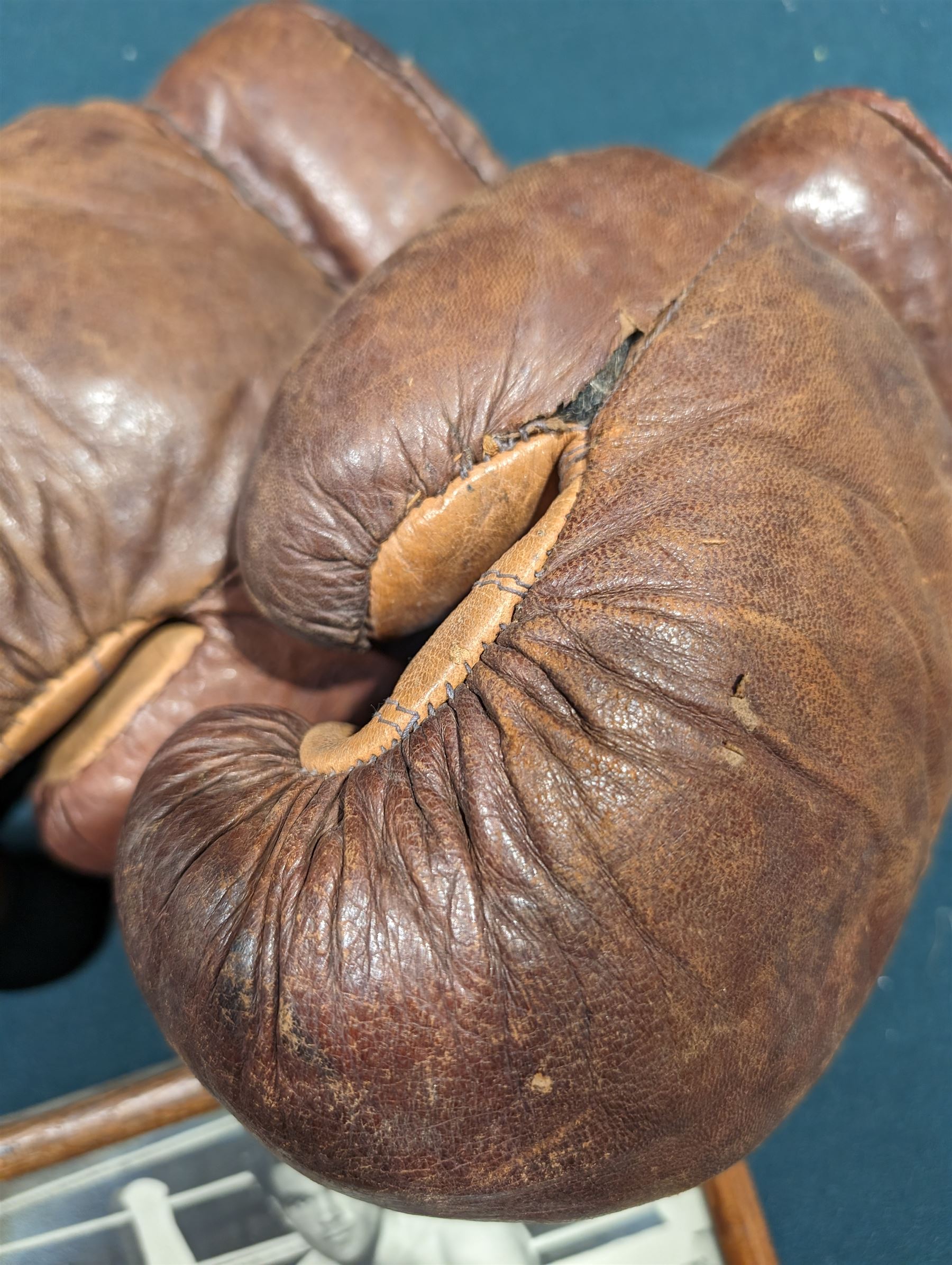 Signed photograph of British boxer Freddie Mills, together with a framed print of boxers Joe Louis and Billy Conn, a signed picture of Giacomo Agostini and a pair of 1930s brown leather boxing gloves