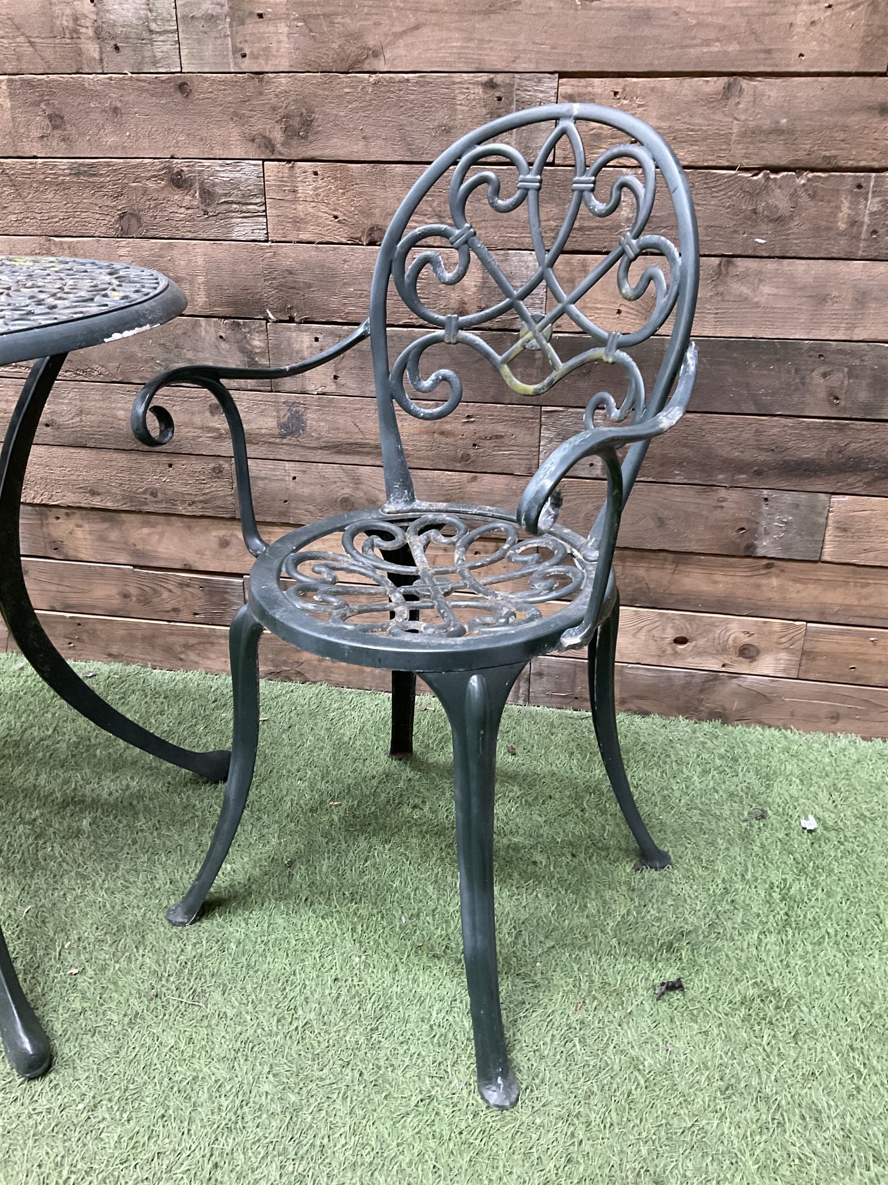 Green painted aluminium circular garden table and two chairs - THIS LOT IS TO BE COLLECTED BY APPOINTMENT FROM DUGGLEBY STORAGE, GREAT HILL, EASTFIELD, SCARBOROUGH, YO11 3TX