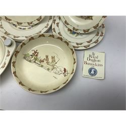 Royal Doulton Bunnykins nursery wares, including twin handled mugs, bowls, plates (17) 