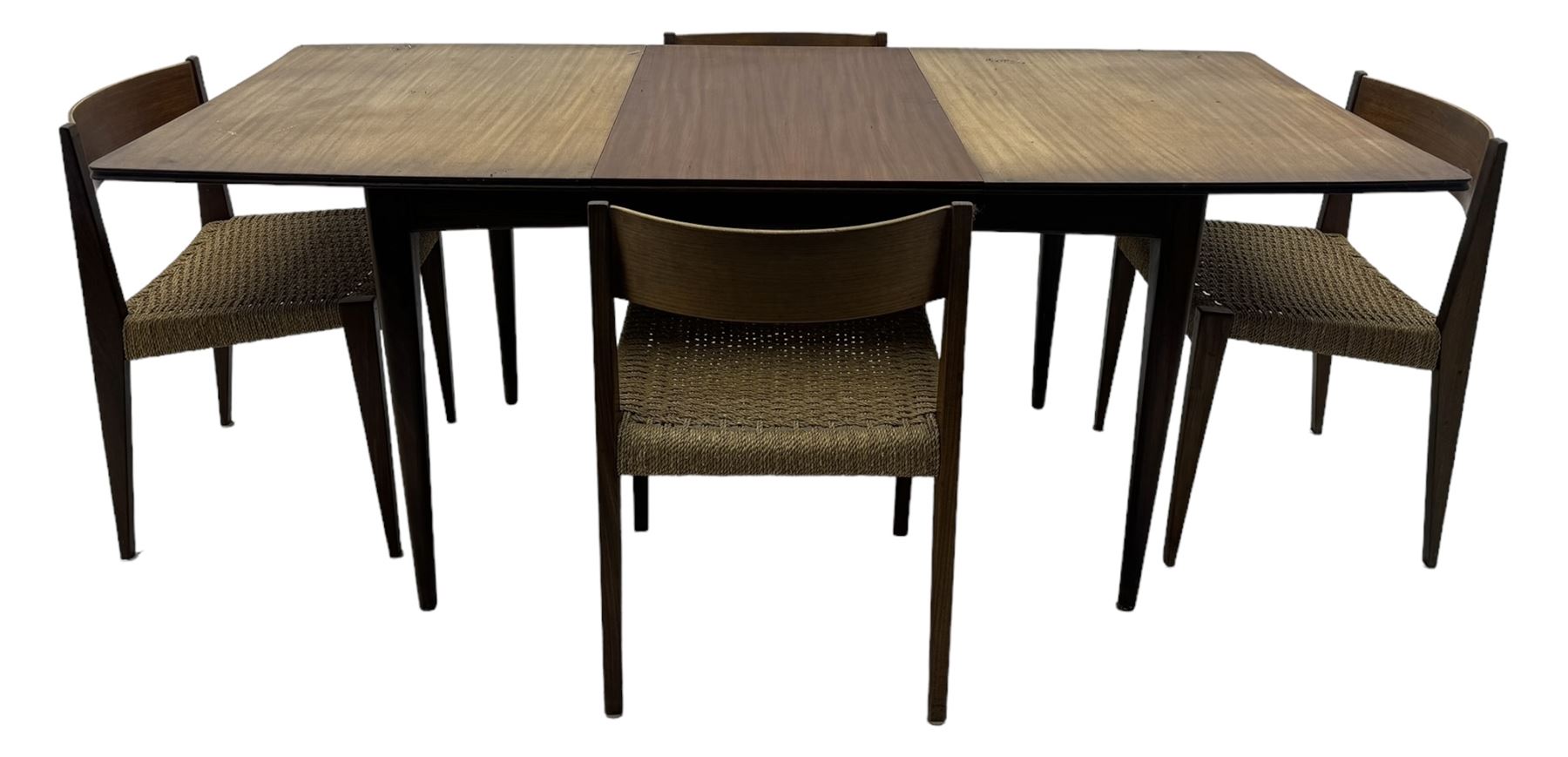 Mid 20th century Danish teak extending dining table, rectangular top with contrasting central draw leaf, on tapered supports; with four teak dining chairs with string seats