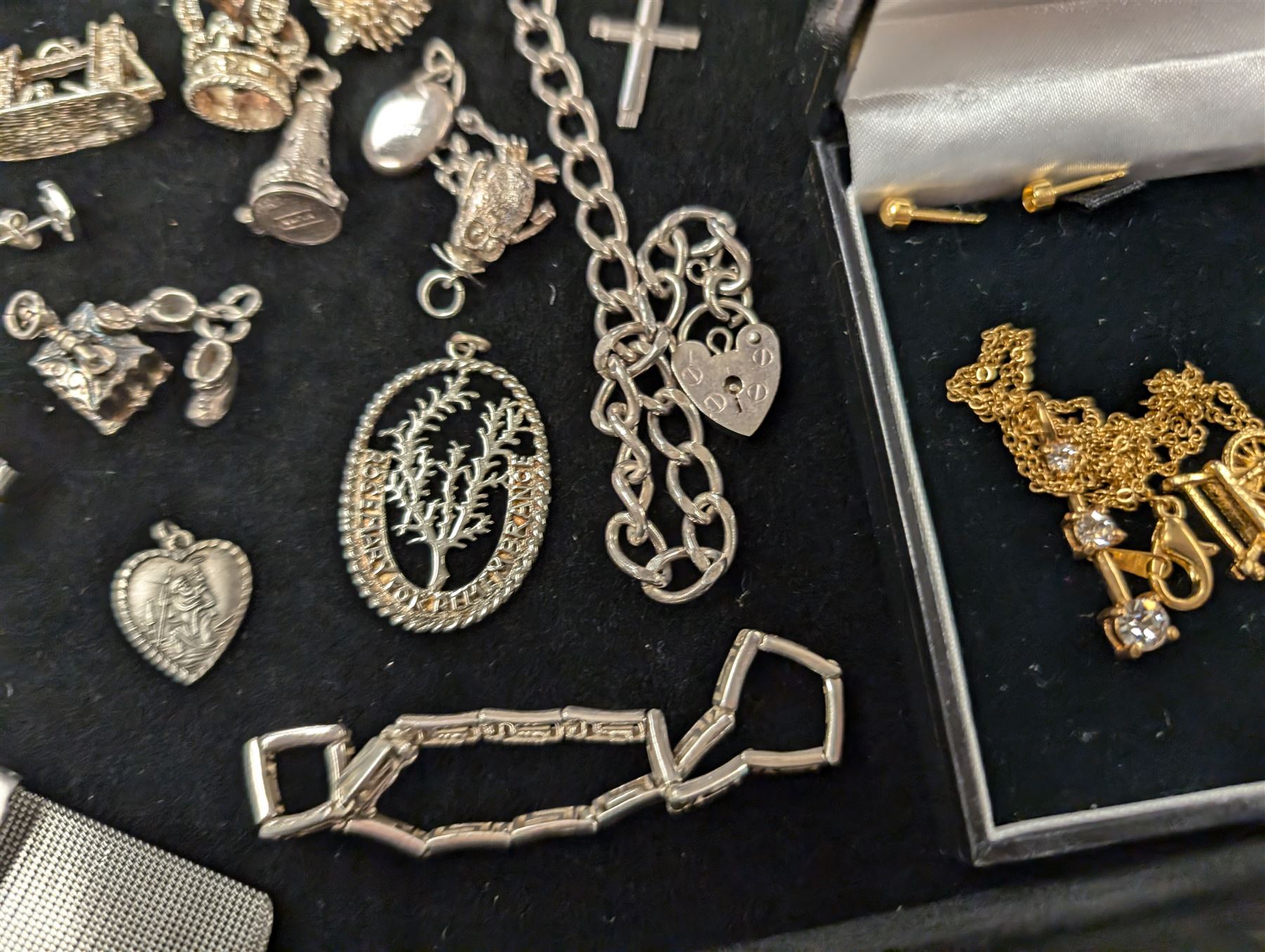 Silver jewellery, including charms, three bracelets and pendant, together with a Seiko wristwatch, Skagen wristwatch, costume jewellery and  a lighter