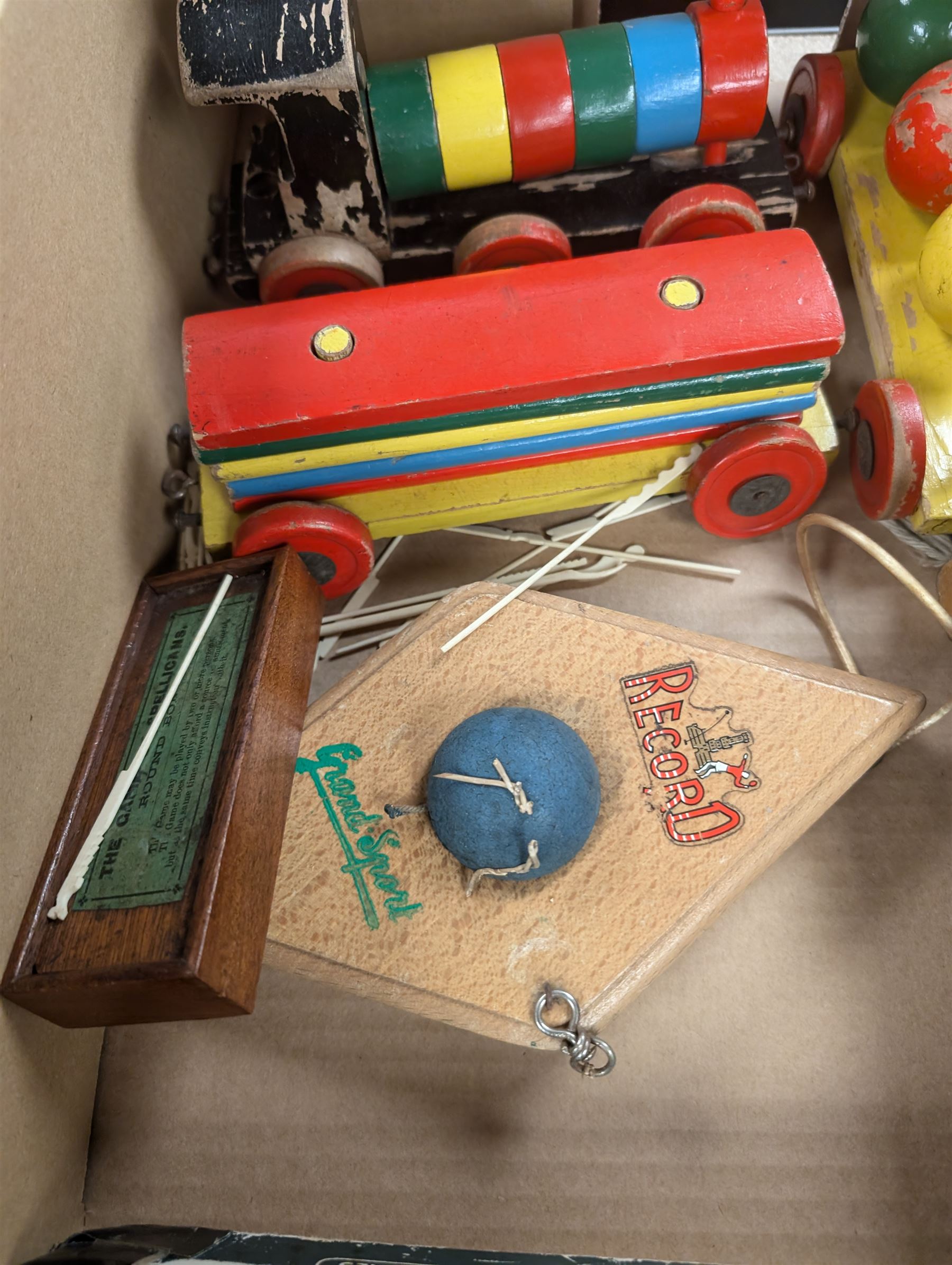 Chad Valley toys and games, including Give A Show projector and a wooden tool bench, together with other wooden toys, Lone Star Trail Boss cap gun and board games