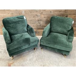 Pair of Howard design armchairs, upholstered in jade green velvet fabric