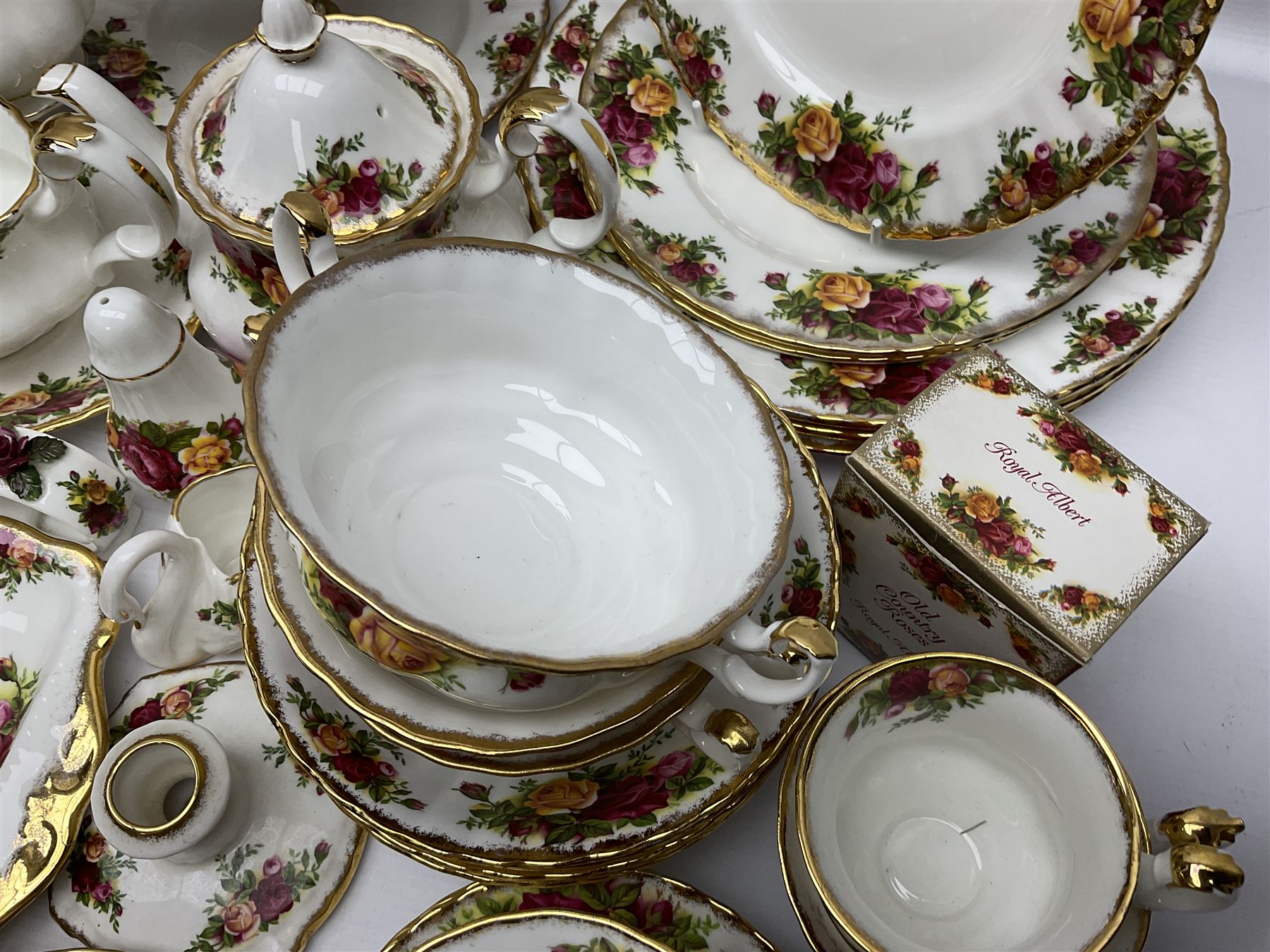 Royal Albert Old Country Roses pattern coffee service for six, comprising coffee pot, milk jug, cups and saucers, cake plate, together with miniature teapot, six teacups and saucers, six dinner plates, six side plates etc 