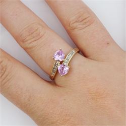 9ct gold two stone heart cut pink sapphire ring, with diamond set shoulders, hallmarked