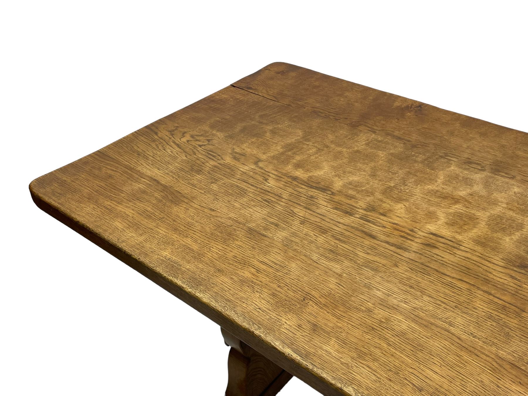 Gnomeman - oak dining table, rectangular adzed top, shaped end supports on sledge feet united by pegged stretcher, by Thomas Whittaker, Littlebeck, Whitby 