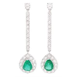 Pair of 18ct white gold pear cut emerald and round brilliant cut diamond cluster pendant stud earrings, total emerald weight approx 1.20 carat, total diamond weight approx 1.50 carat